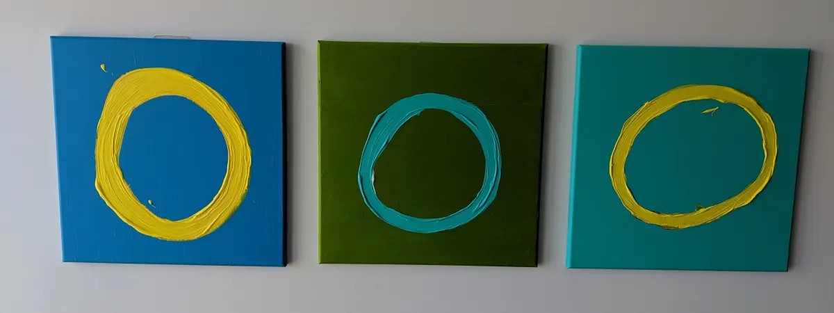 Three blue, green, and turquoise abstract paintings marked with thick circular gestures.
